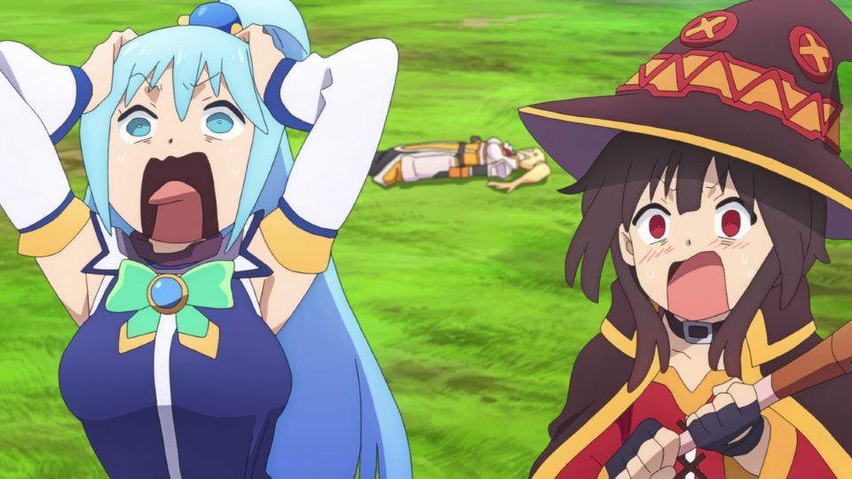 Konosuba characters Aqua and Megumin with mouths agape like they're screaming with the prone body of Darkness lying on grass behind them.