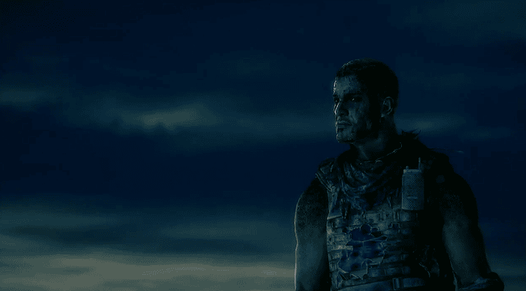Profile of Captain Martin Walker from Spec Ops: The Line against a dark cloudy sky.
