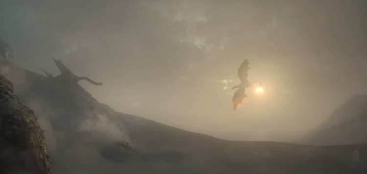 A distant silhouette of two dragons, one on a hillside and another flying toward it, the sun in the sky behind them.