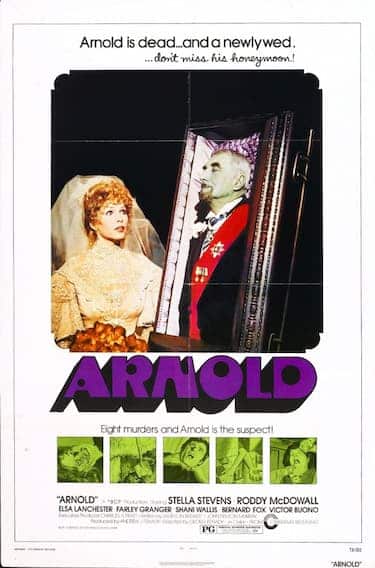 A blushing bride In a mausoleum standing next to an elegantly dressed man in an upright  casket.
A.movie poster from 1973 Arnold
