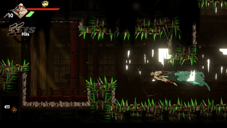Joe Musashi is dashing through the air. The corridor is lined with green spikes.